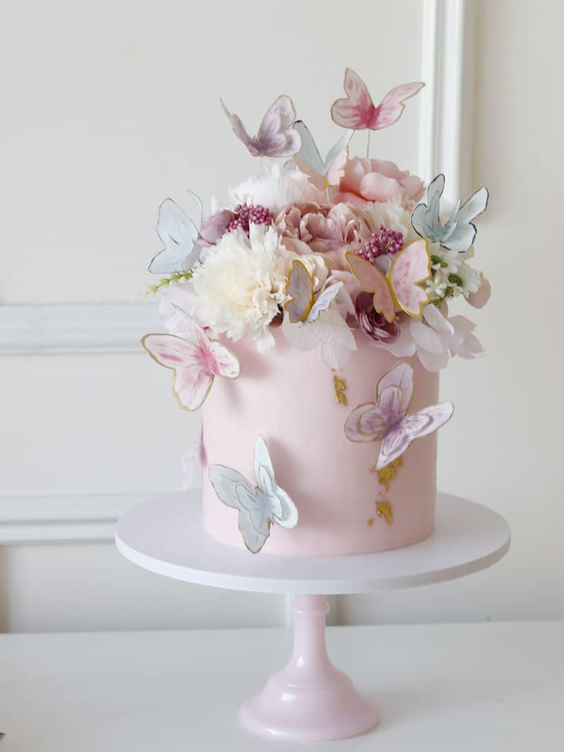 937261_682471c92ff2406a9202c05c9b8d462dmv2.jpg Pink Butterflies Flowers Cake - Image 1