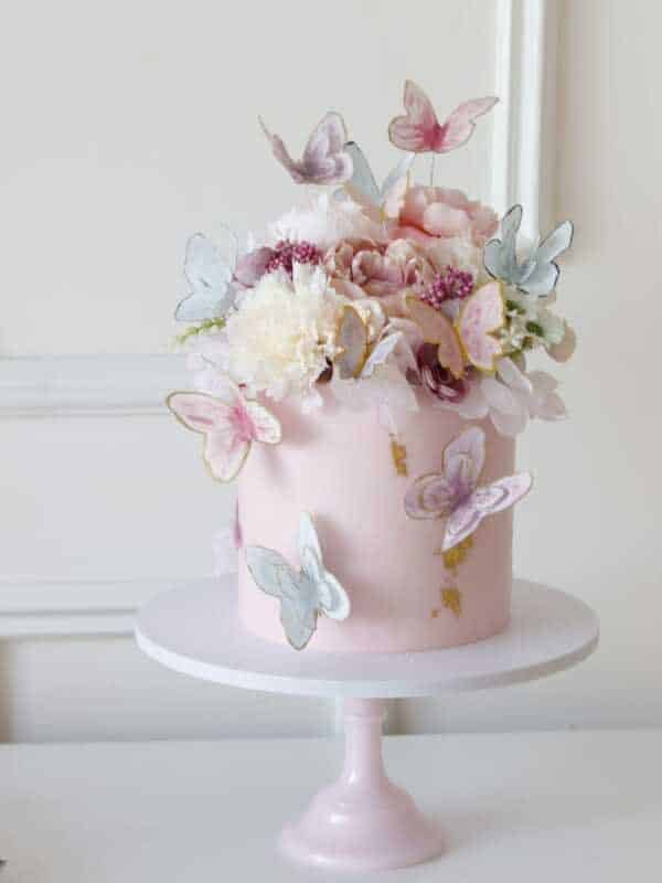 Pink-Butterflies-Flowers-Cake2.5kg-550-AED3kg-650-AED.jpeg Pink Butterflies Flowers Cake - Image 1